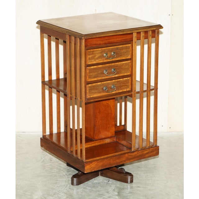 We are delighted to offer for sale this exhibition quality English Walnut with Satinwood inlay, circa 1880 revolving...
