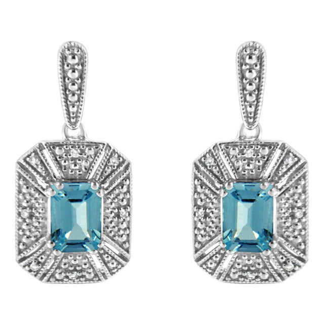 .925 Sterling Silver 7x5MM Emerald Shape Blue Topaz and Diamond Accent Art Deco Halo Style Drop and Dangle Earrings (I-J Color, I1-I2 Clarity) For Sale