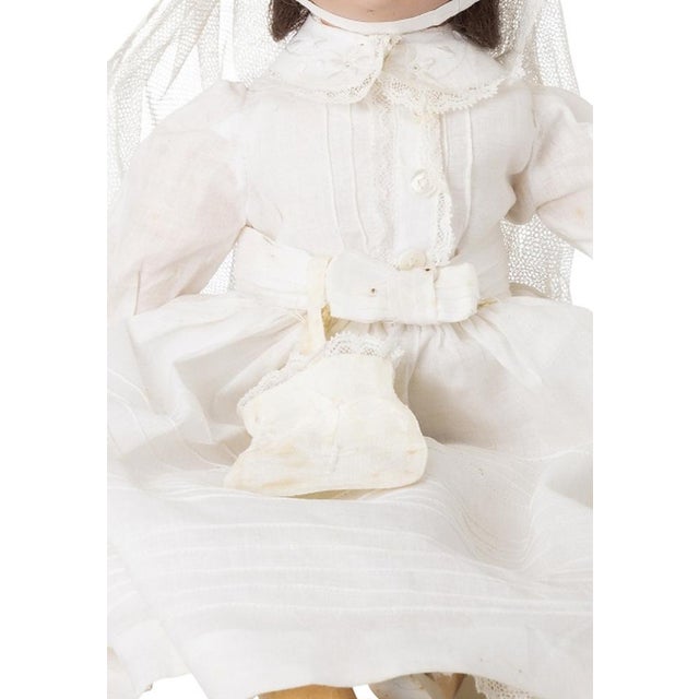 Antique toys - Porcelain doll - Heinrich Handwerck. German; early 20th century. Porcelain head; papier-mâché body;...