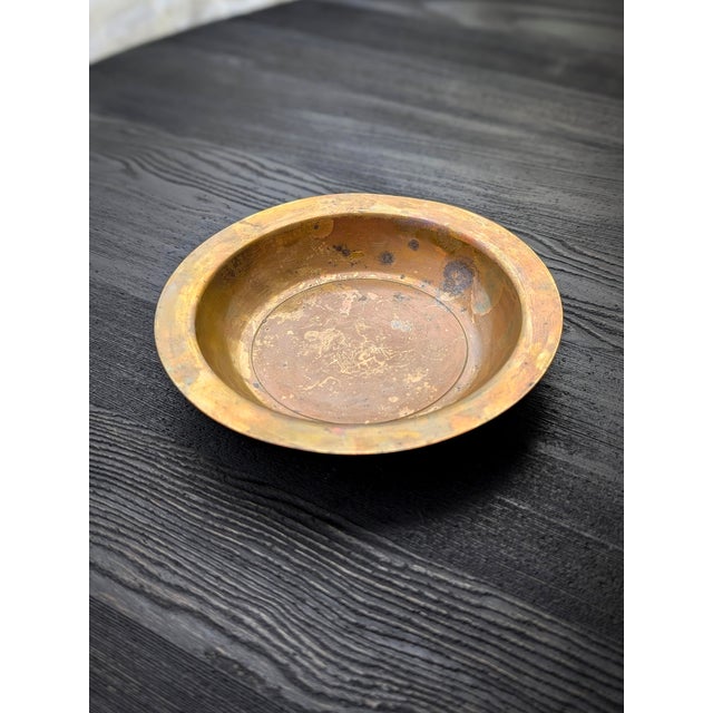 A small vintage Danish bronze vide poche by Argentor, created circa 1930. This art deco inspired circular piece features a...