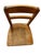 Child-size wooden school chair with a saddle-style seat. The underside is ink-stamped Allen Chair Corp., West Concord,...