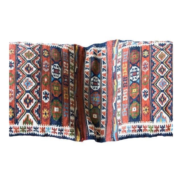 A wonderful mid-20th century Persian Soumak saddle bag face, woven with a tribal pattern with stylized stars and flowers,...