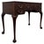 An elegant and beautifully crafted early 20th-century English Edwardian writing table, constructed in richly coloured...