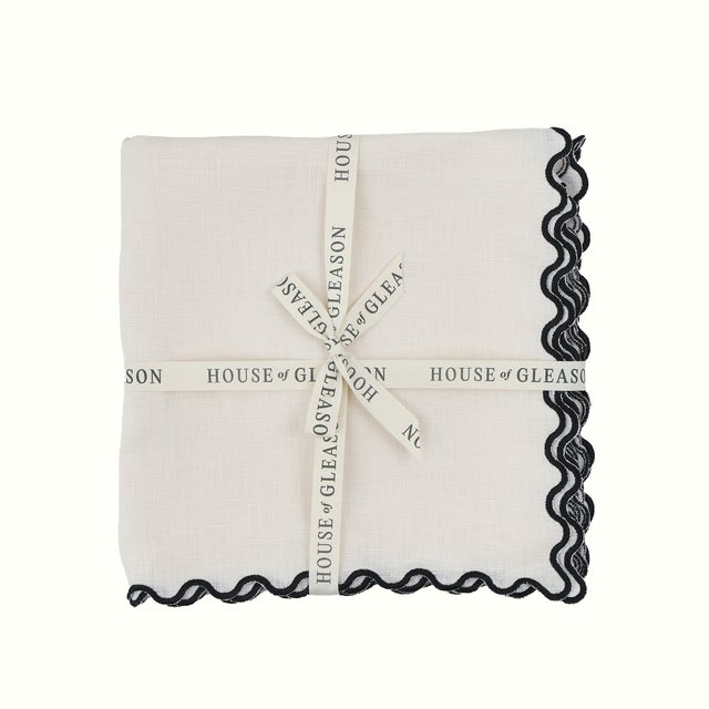 Add a little extra polish to your place settings with The Vivienne dinner napkins—where timeless linen meets a playful...