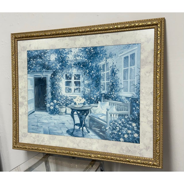 Design Plus Gallery presents a Framed Courtyard Garden Print from Marc Lamers. This artwork depicts an intimate garden...