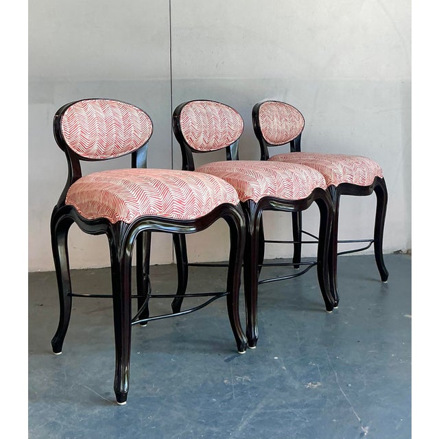 Elevate your home bar or kitchen island with this exquisite set of three "Cafe Du Paris" barstools by the renowned...