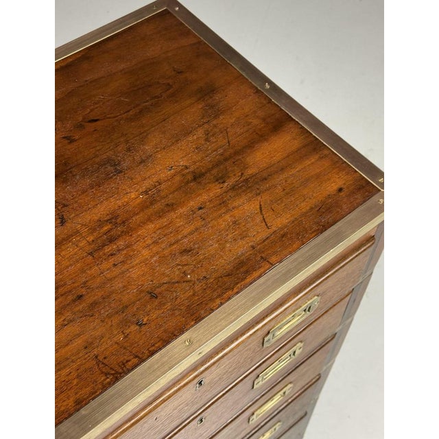 Campaign Chest of Drawers. Originating from England, made in the 19th century. with handles on the sides for easy...