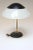 Gerald Thurston for Lightolier table/desk lamp with oversized, fully adjustable shade (ca. 1950s, USA). Black enameled...