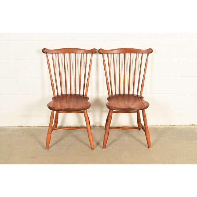 A gorgeous pair of American Colonial or Arts & Crafts style solid cherry wood spindle back Windsor side chairs or dining...