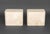 Pair of Modern Crema Marfil Marble Side Tables, rectangular with canted corners. 16" H x 20" W x 12" D. Provenance: From a...