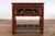 A Chinese red lacquered console table from the 20th century made with 19th century carved pieces, with very unusual hand...