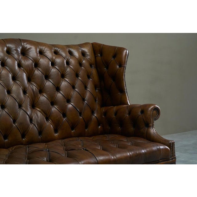 English Tufted Wingback Settee in Patinated Leather, 1900 For Sale - Image 3 of 17