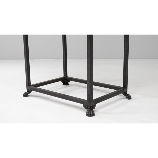 This 19th-century French wooden display case combines refined craftsmanship with industrial character. The glass-paneled...