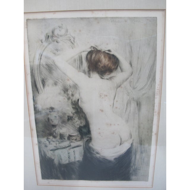 Manuel Robbe (French 1872-1932) drypoint etching on paper, 'Nu Se Coiffant' (Woman Doing Her Hair). Showing a woman from...