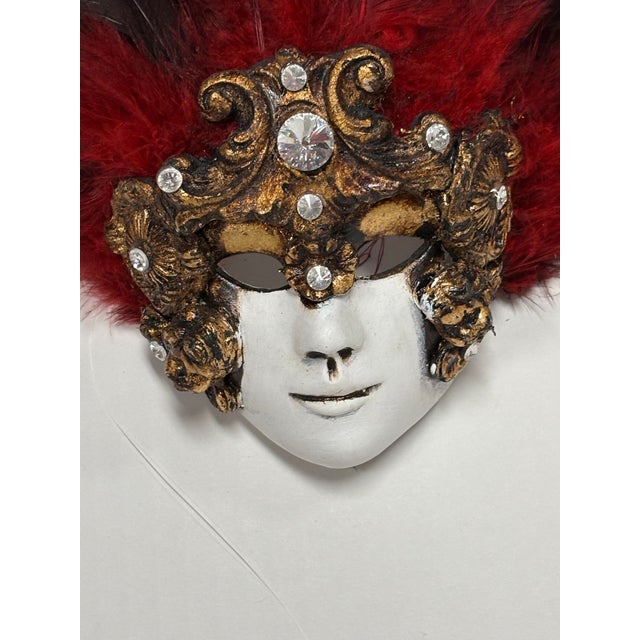 This ceramic mask was handmade by the Artisans of Casin dei Nobili, one of Venice's most prestigious Mask Makers. Made...