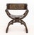 Renaissance Revival Walnut Savonarola Chair, carved mask heads and lion head to the arms, painted leather sling seat on...