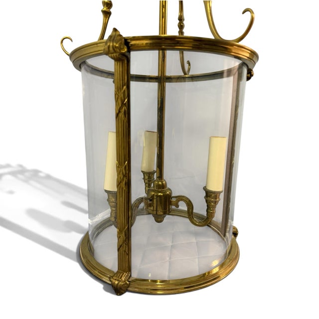 A striking lantern made by luxury lighting company Vaughan Designs. Cast in solid brass, the lantern is inspired by the...