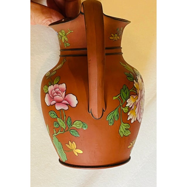 A fine Georgian English Terracotta Pottery Jug hand painted in the Rosso Antico style by Wedgwood and dating from the...