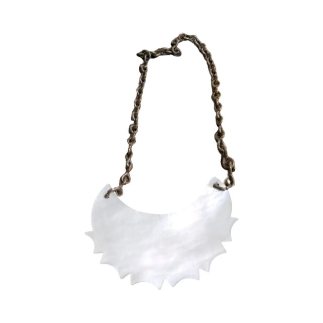 A Fine Mother of Pearl Decanter Tag for Port made around 1900 measuring 2 inches wide by 1.5 inches high