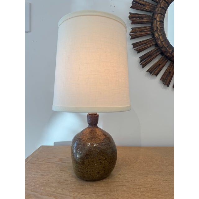 Vintage small scale ceramic lamp, France. This green / brown ceramic lamp is the perfect little lamp to add charm to your...