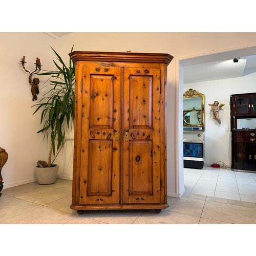Antique, rustic Swiss pine wardrobe/chest/fireplace. Dimensions: Height x Width x Depth 181 x 121 x 64 cm. For sale is a...