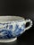 An authentic example of early Dutch Delftware, this two-handled faience bowl features hand-painted cobalt decoration over...