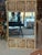 Vintage large woven rattan, spun wicker wall mirror. Dimensions: 60 H x 36 W x 1.5 D. Wicker is in excellent condition but...
