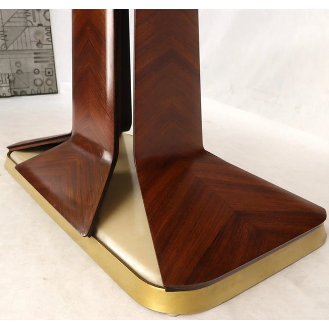 French Art Deco boat shape beige marble top dining conference table. Atr. or in style of Borsani. Elegant low profile bent...