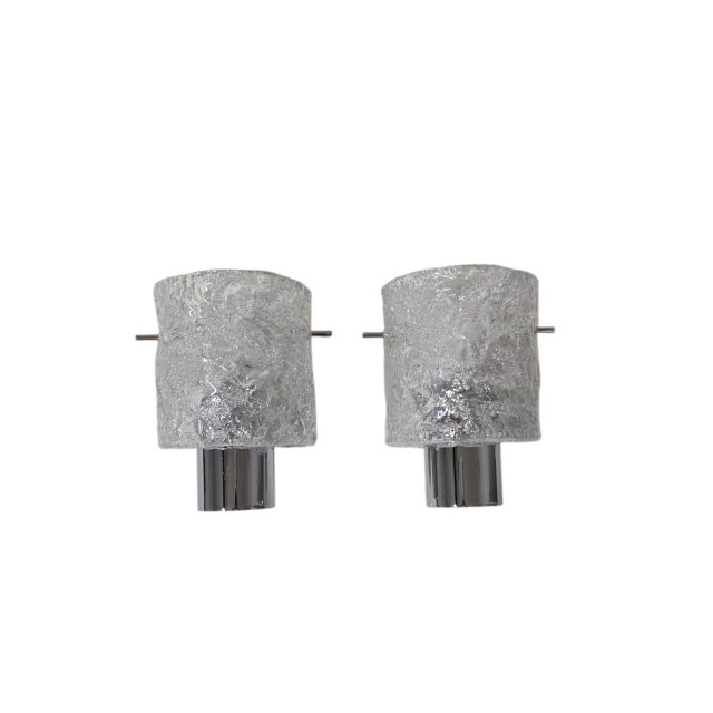 A unique set of wall lights in the mid-century modern style, designed by egon hillebrand in the 1960s. This exquisite...