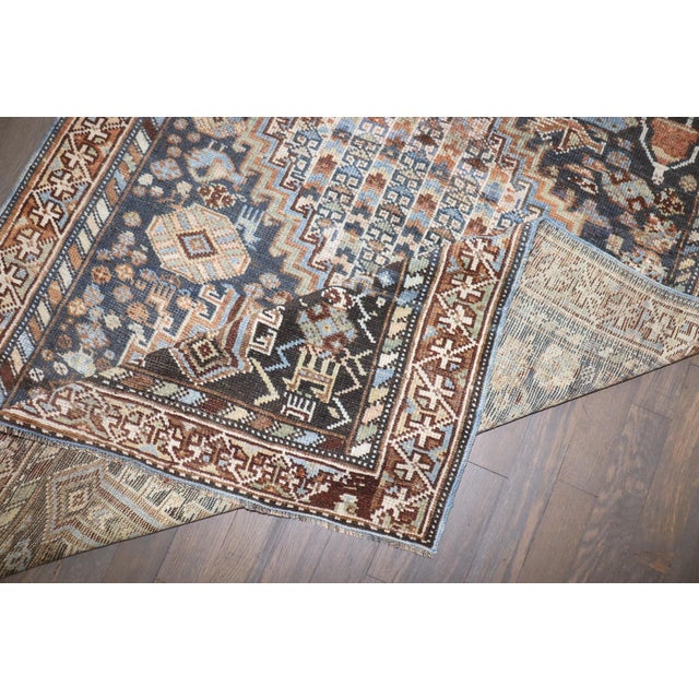 A 1920s Persian Shiraz geometric tribal rug
