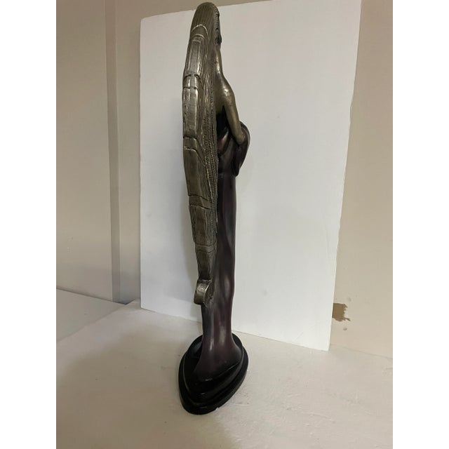 A dramatic Art Deco-inspired sculpture designed by Claude Le Clerc and produced by Austin Productions in 1986. This...