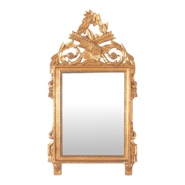 Vintage Italian Made Louis XVI Style Carved Giltwood Mirror With Elaborate Floral Crest For Sale
