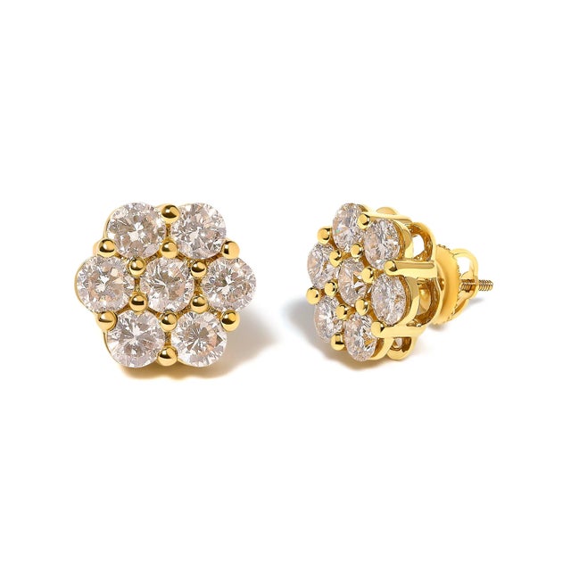 Imbued with the luminous charm of a blossoming garden, this pair of stud earrings transforms the classic allure of 14K...