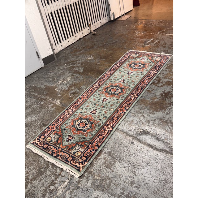Design Plus Gallery presents a 2ft 9in × 8ft 3inVintage Wool Runner Rug. This narrow runner rug showcases a series of...