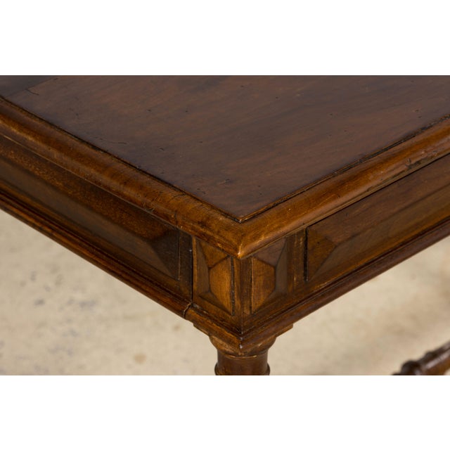 A refined late 19th century French Louis XVI style writing table, sourced in Provence, France and handcrafted in solid...