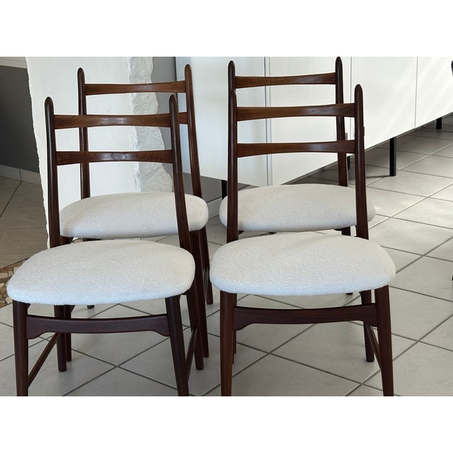 Set of four chairs by Wilkhan de Georg Leowald, Germany, vintage 1960s. Chairs entirely made of teak, with white bouclé...