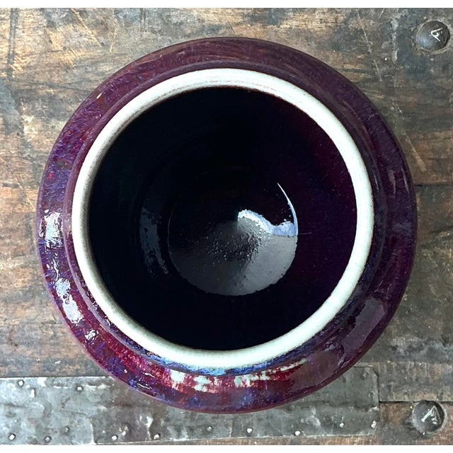 This stunning vintage studio pottery vessel from Sun Valley is a vibrant celebration of color and form. Hand-thrown with a...