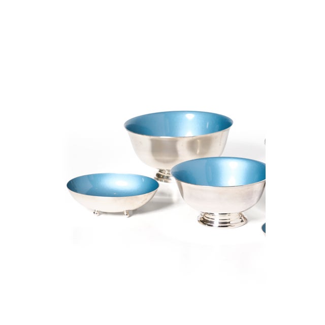 Reed & Barton bowls, featuring elegant silver-plated bottoms and bold enamel tops.Styling a space with these offers...