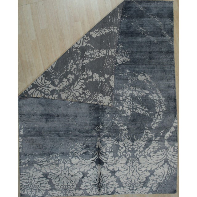 Classic Unique Black Hand Knotted Wool & Bamboo Silk Rug, Country of Origin: India. This exceptional piece showcases the...
