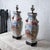 A pair of Chinese export hunt scene porcelain lamps, 20th century. 7 inches wide by 6 inches deep by 20 inches tall; 16 ½...