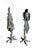 An impressive pair of monumental patinated bronze sculptures depicting exotic parrots perched upon naturalistically...