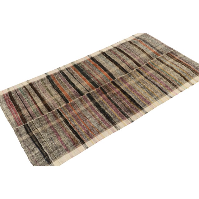 Originating from Turkey circa 1950-1960, a 6x10 vintage kilim rug now entering our classic flat weave selections....