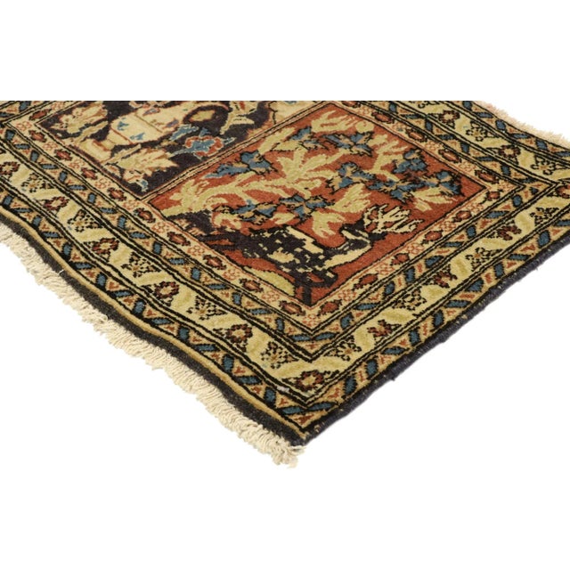 With its effortless beauty, incredible detail and texture, this hand knotted wool vintage Persian Mashhad rug is a...