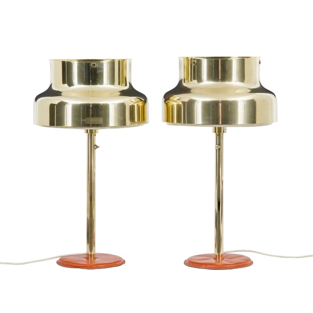 Stunning piece of design with these well known ‘bumling’ design lamps by anders pehrson for atelje kyktan. Shades in brass...