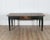A characterful Swedish country kitchen table from the 19th century, retaining its original dark green painted finish with...