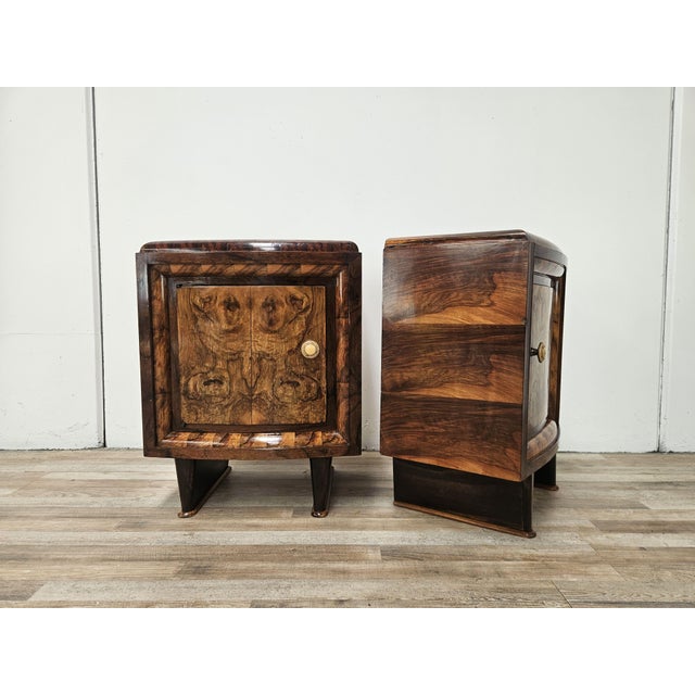 Splendid Tuscan bedside tables from the 1940s, featuring a fine walnut burl veneer that gives the piece a natural,...