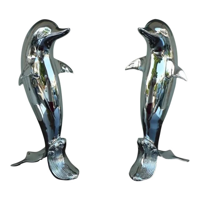 Pair of 70's Chromed Upright Swimming Dolphins For Sale