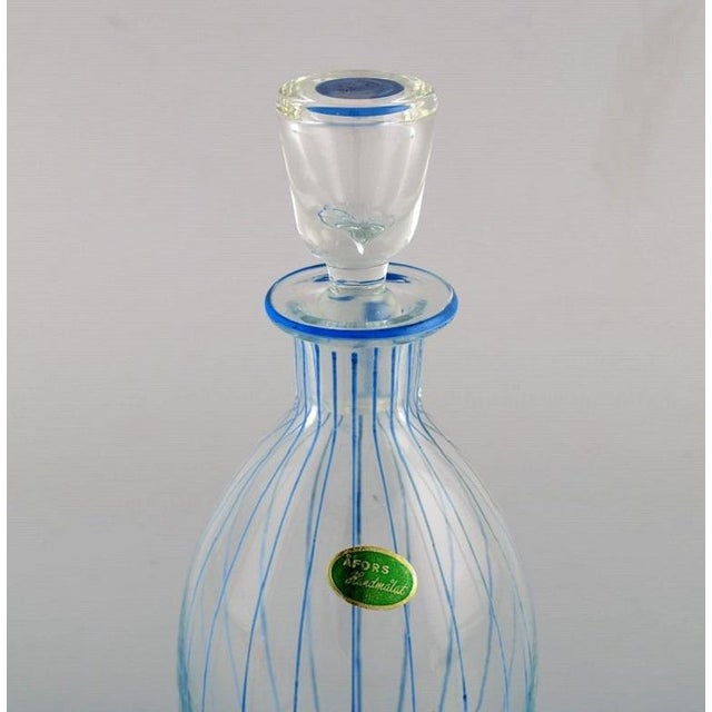 Åfors carafe in hand-painted mouth-blown art glass. Swedish design, 1960s. Measures: 19.5 x 8.5 cm. In excellent...
