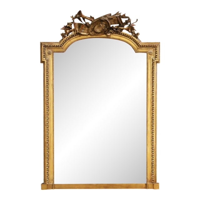 19th Century French Louis XVI Giltwood Mantel Mirror With Musical Trophy Crest For Sale