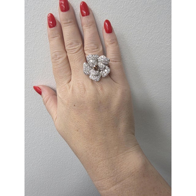 Estate 18K Kwiat Diamond Flower Ring This elegant estate ring by Kwiat is crafted in 18K gold and showcases the house’s...